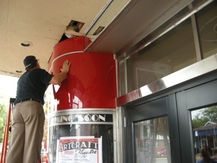 Man Working on a Wall Vitrolite